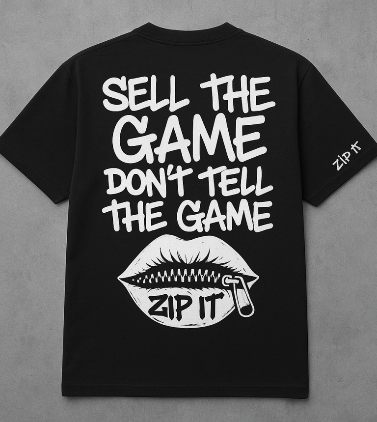 Gray t-shirt featuring lips with a zipper and the phrase "The game is to be sold, not told."